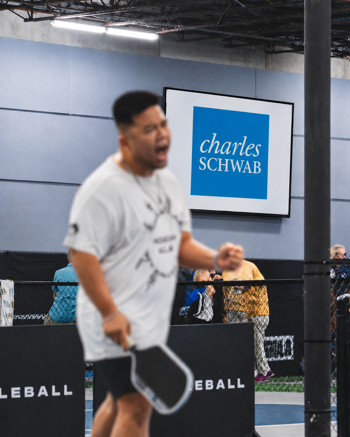 Branded event setup at ERA Pickleball — Charles Schwab Fall Frenzy court backdrop